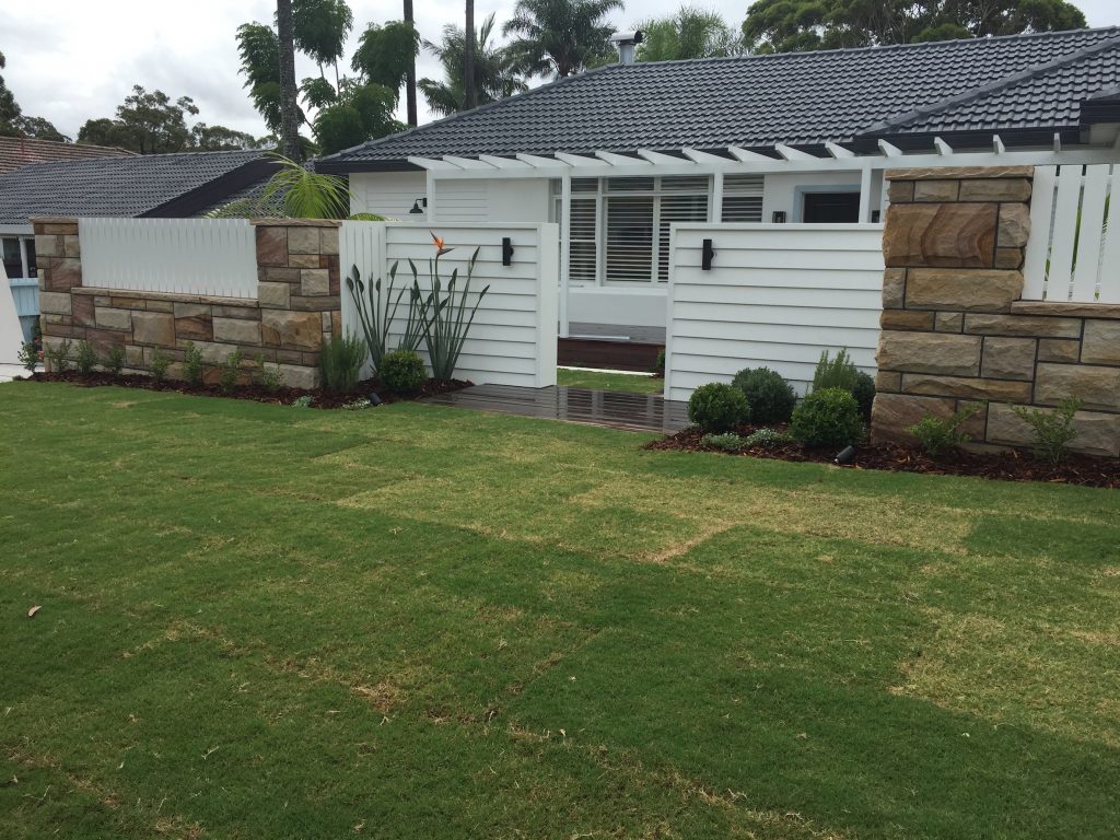 front house grass fence stone